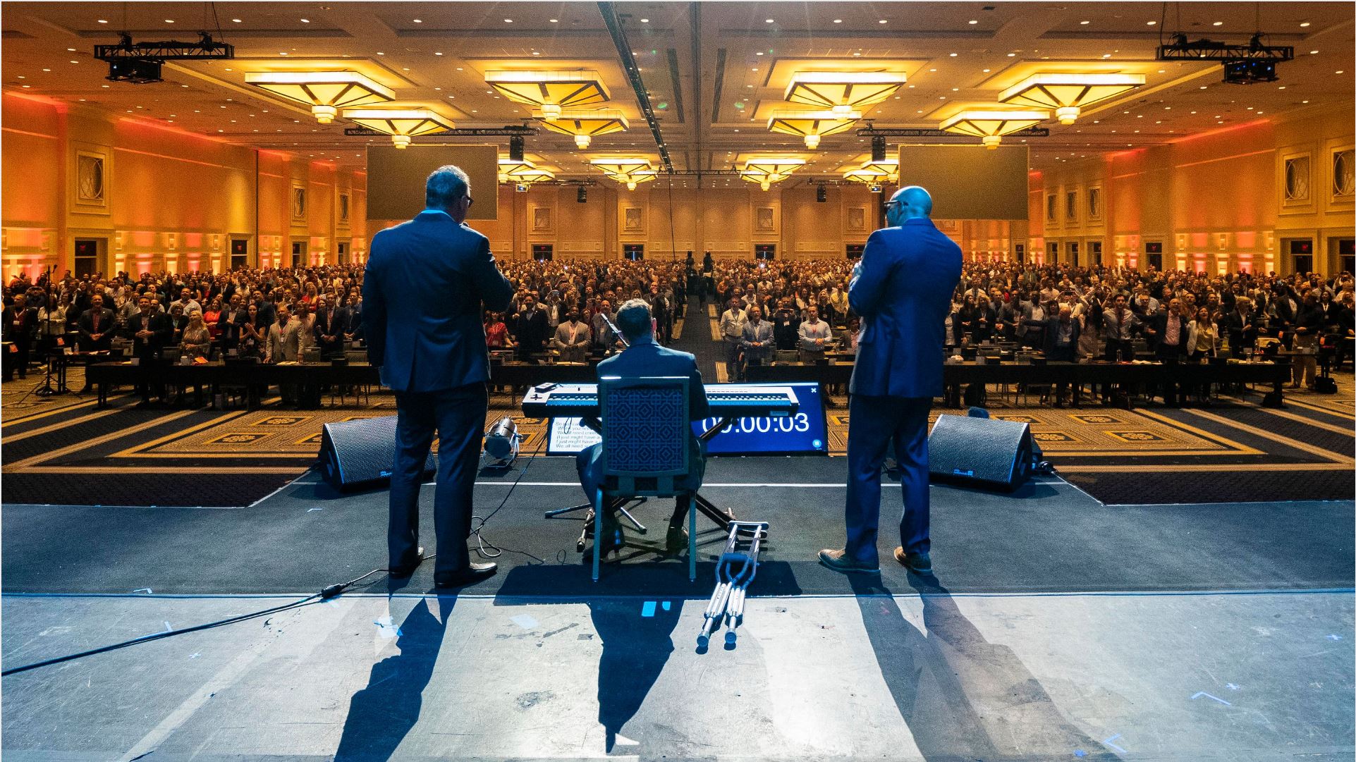 Symmetry Financial Group Founders on stage at the 2021 National Conference