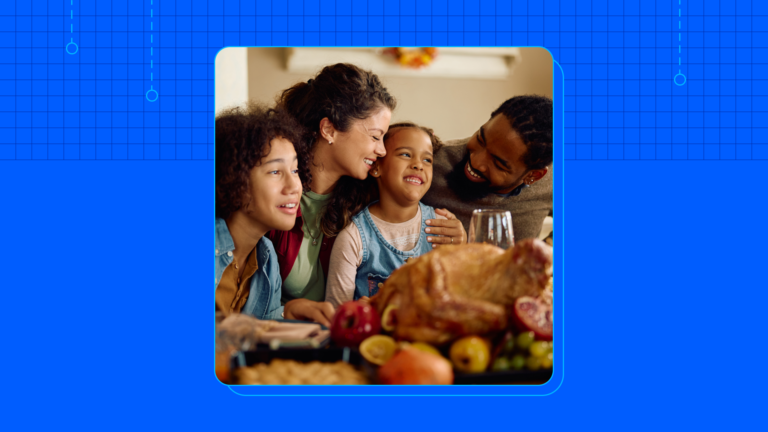 A family gathered around the table for thanksgiving dinner.